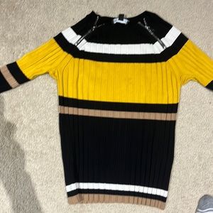 Great shirt with jeans or dress pants. Made out of rayon and nylon.